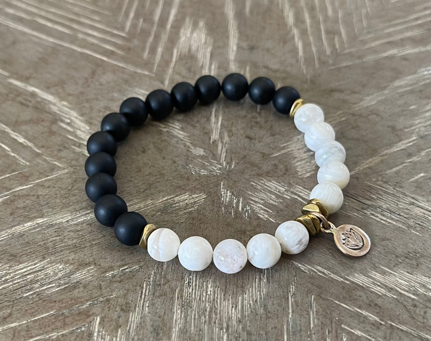 BLACK ONYX + SAKURA QUARTZ LOTUS CHARM BRACELET